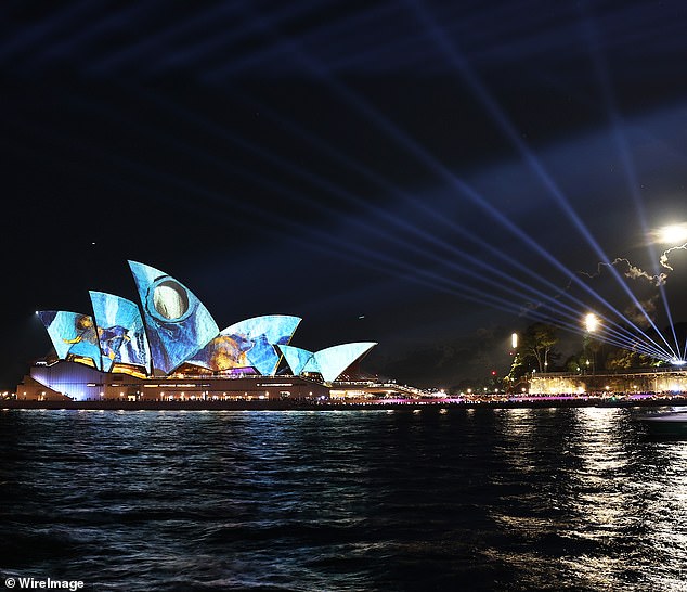 Spectators can enjoy the sails of the Opera House, wrapped in a projected patchwork of fabric