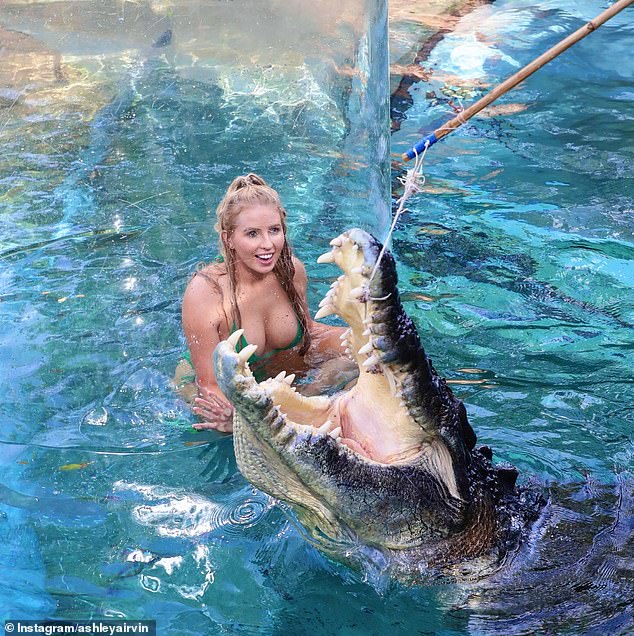 Married At First Sight bride Ashley Irvin managed to shorten her bucket list when she got the chance to swim with a ferocious crocodile