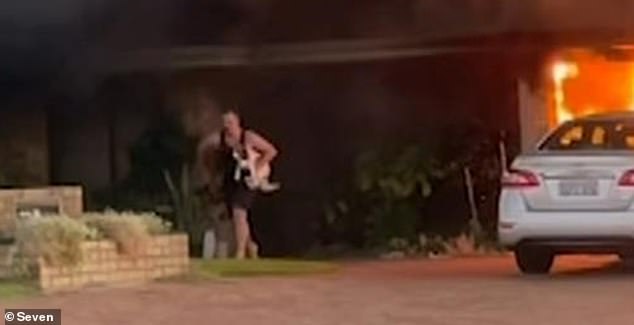 A man bravely rescued two dogs from a burning house in Winthrop (pictured) in Perth's south on Tuesday after the property went up in flames