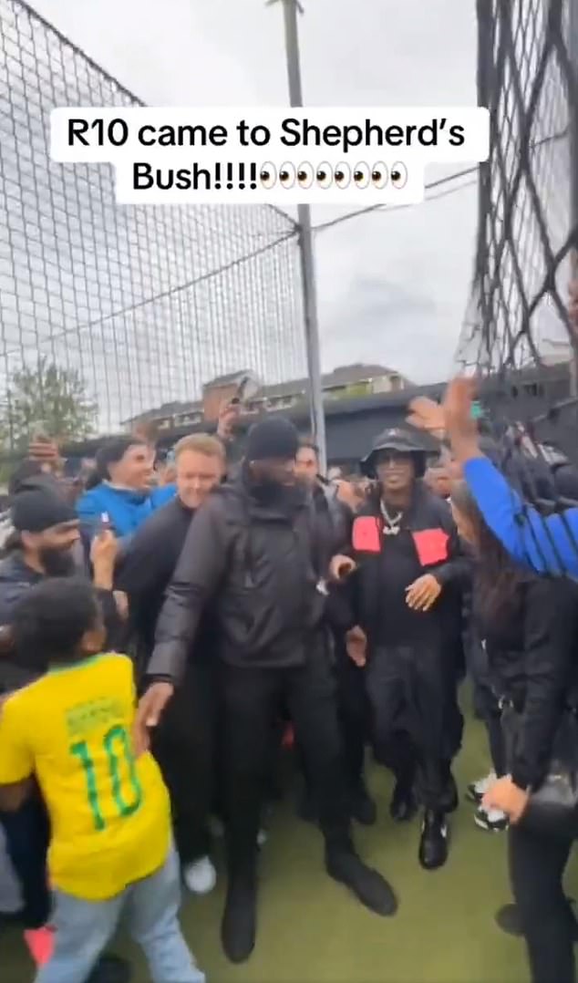 Stunned onlookers recorded videos of Ronaldinho being escorted through a large crowd