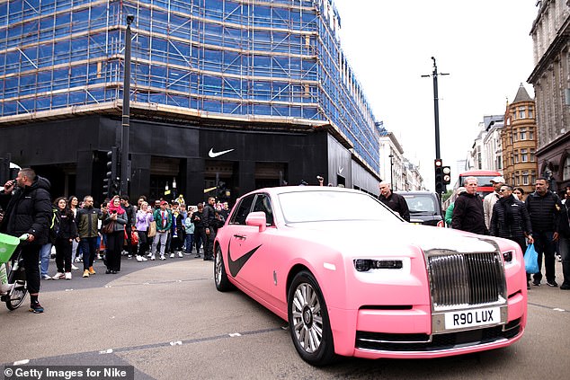 The luxury vehicle was decorated with the large Nike check mark on both doors