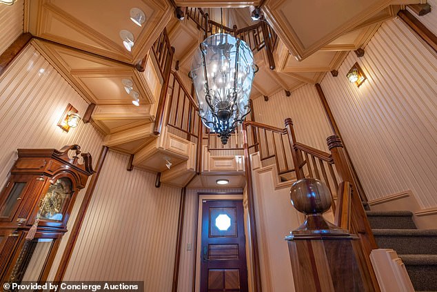 Built in 1996, the Nestucca Sea Ranch is a traditional style home featuring a lavish spiral staircase with ornate mahogany millwork