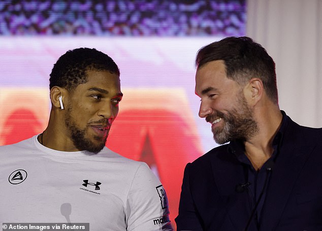 It is understood that Joshua (left) has 'no plans to be involved' at this stage and is 'focused on boxing'