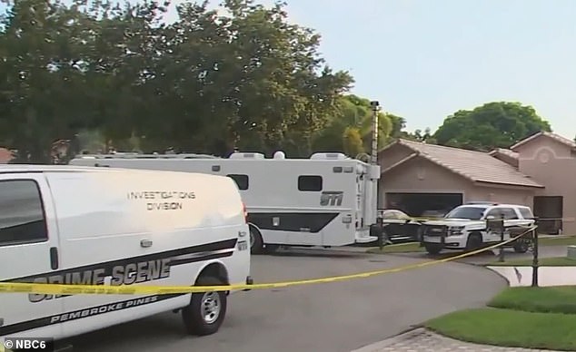 Police block the scene in Pembroke Pines, south of Miami