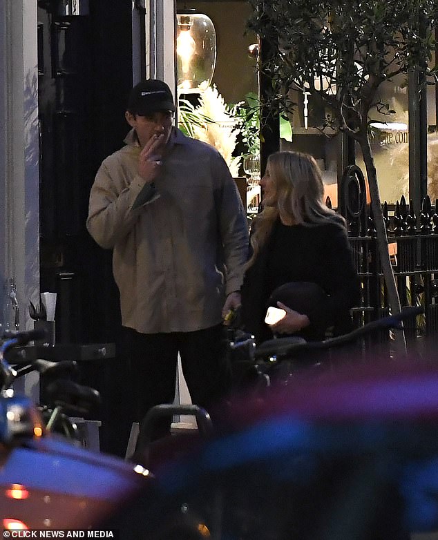 The 37-year-old singer smiled brightly as she walked alongside the 32-year-old art dealer as they left the eatery separately after meeting for dinner.