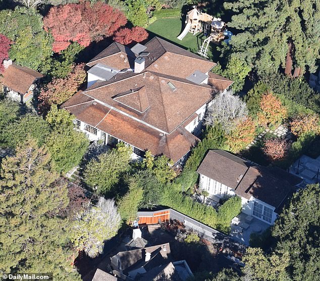 The dilapidated house is said to have neighbors including Mark Zuckerberg, whose Palo Alto home (pictured) was built for $37 million