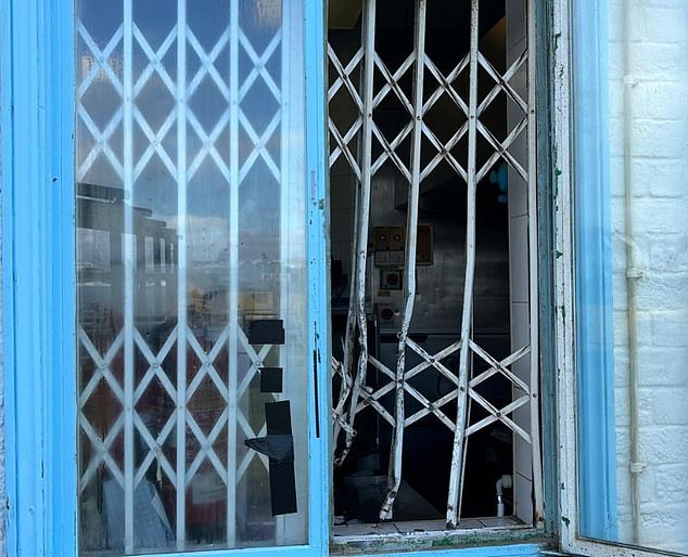 In an instant, the blue framed window could be seen wide open as the shutters were pulled from the center