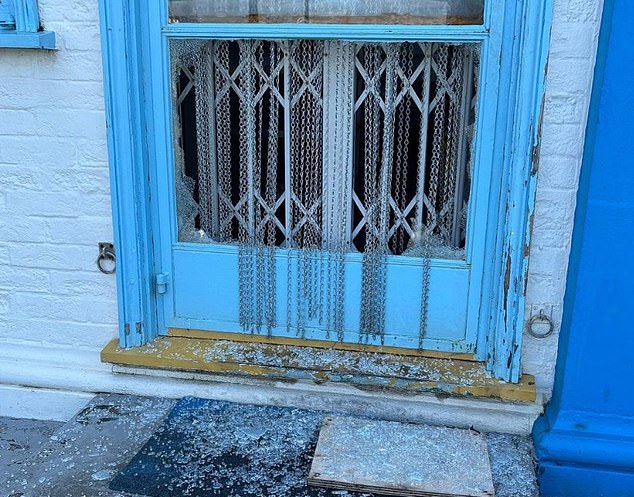 Shards of broken glass could also be seen on the ground outside the cafe's main entrance