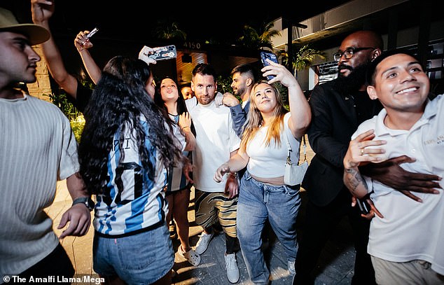 Several fans wearing Argentina shirts with Messi's name had their pictures taken with the star