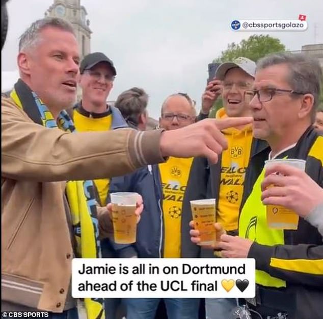 Carragher sang with the Dortmund fans, while also making a comment saying 'where have you gone now, Madrid'