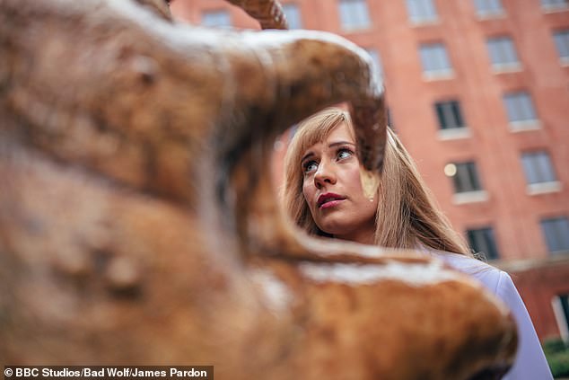 She gets so caught up in the bubble that she doesn't notice giant slugs eating everyone around her