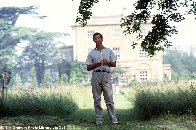 Prince Charles stands in the Highgrove gardens in 1986, when their redevelopment was in full swing