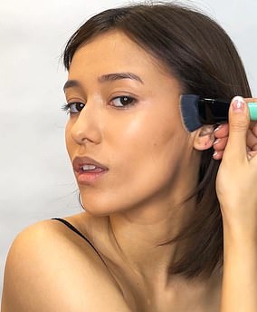 Drag the brush up towards the top of your ear so that no harsh lines are visible