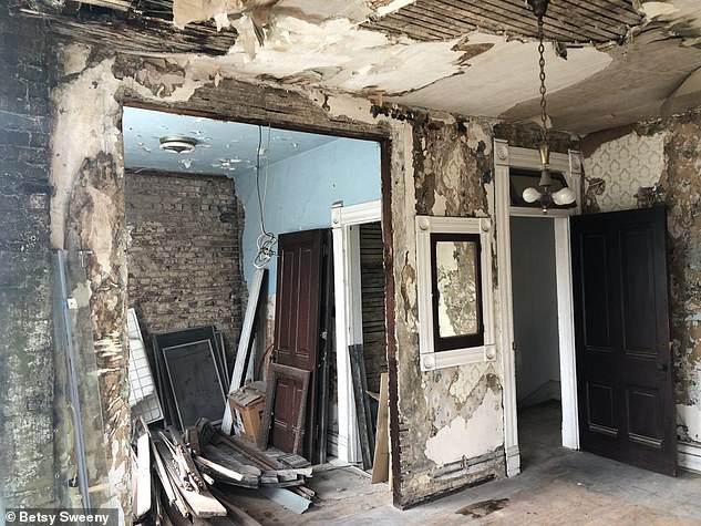 From 2020 to 2021, she removed plaster and rotting wall boards throughout the house