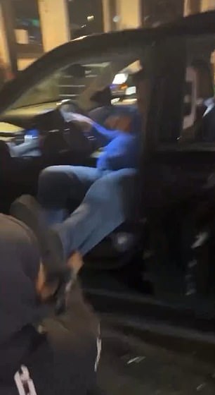 The attacker then grabbed his legs and tried to pull him out of the car, allowing the entire group to slam him to the ground.