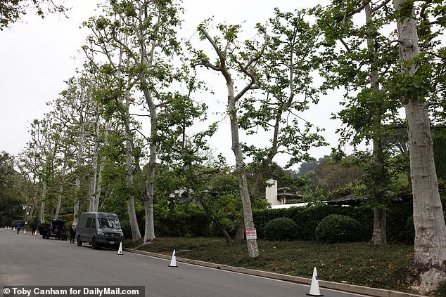 The secluded property, hidden behind an ivy-covered 7-foot stone wall and a large wooden gate on the driveway, was first built in 1937 as a horse ranch.