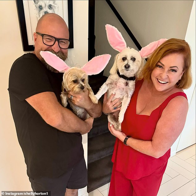 The Talking Married presenter has two dogs with her husband Darren Robinson (left) and describes herself as 'proudly childfree by choice'