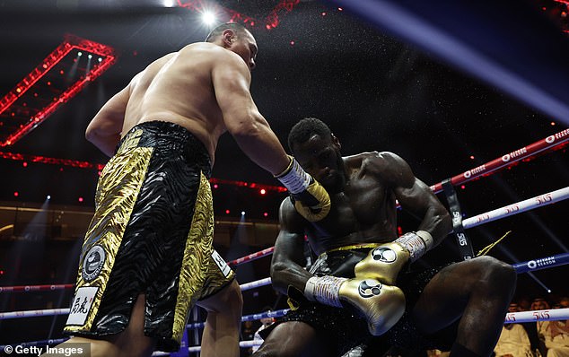 1717291728 371 Zhilei Zhang KNOCKS OUT Deontay Wilder in fifth round with