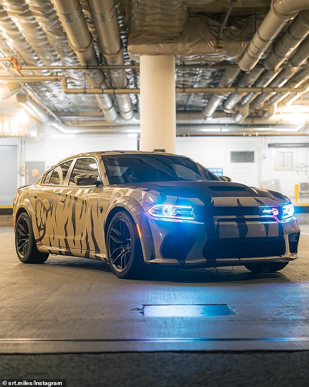 Hudson drives quickly through Seattle in his Dodge Charger Hellcat