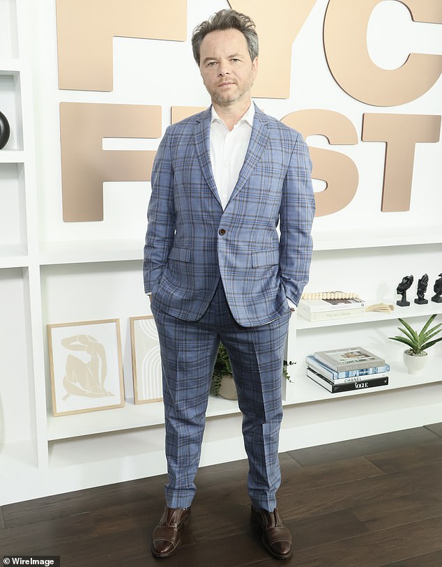 Noah Hawley wore a plaid blue suit, white shirt and dark brown leather shoes as he spent time with the actors