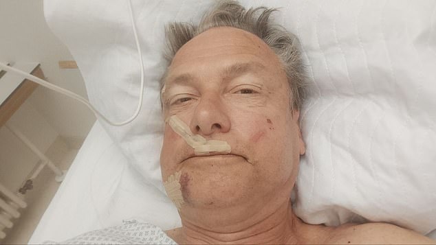 Mr Stuerzenberger posted this photo yesterday from his hospital bed after being stabbed by a knifeman