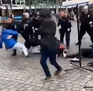 Officers could be seen lunging at the man