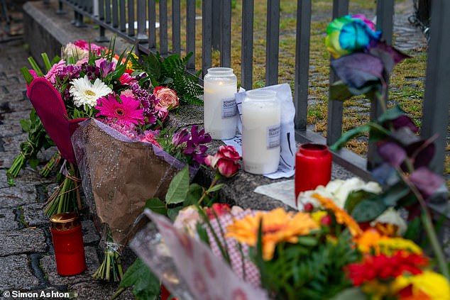 Locals in Mannheim were shocked by the frenzied attack and came to the market square to lay flowers and light candles for the victims