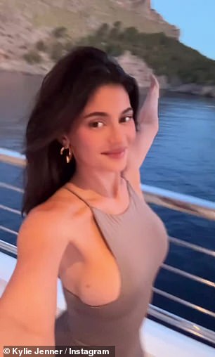 The Kylie Cosmetics founder appeared carefree as she frolicked around the deck of the luxury yacht