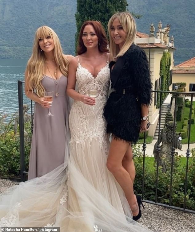 The former pop star added that Natasha, Liz and Jenny decided to 'move on without her', but added: 'I wish them all the best' (Liz and Jenny pictured at Natasha's wedding)