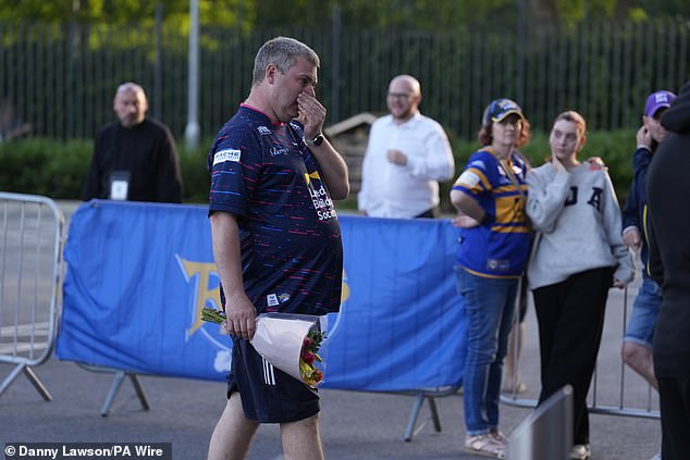 Supporters comforted each other as they continued to step forward in Burrow's memory