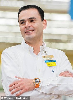Pictured is Calexico, CA Walmart manager Oscar Romero.  Manager Oscar Romero says his day started with 40 minutes of paperwork before Walmart introduced a better technical system