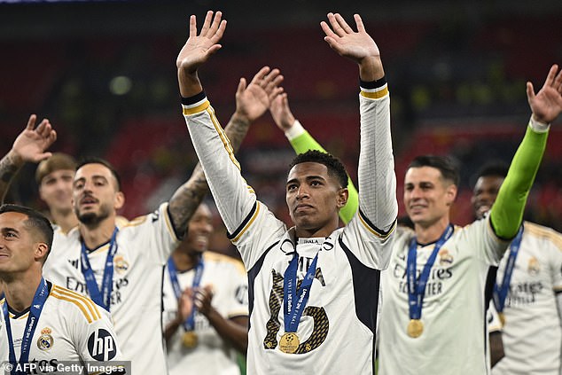 Bellingham (centre) celebrated with his teammates at full-time at Wembley