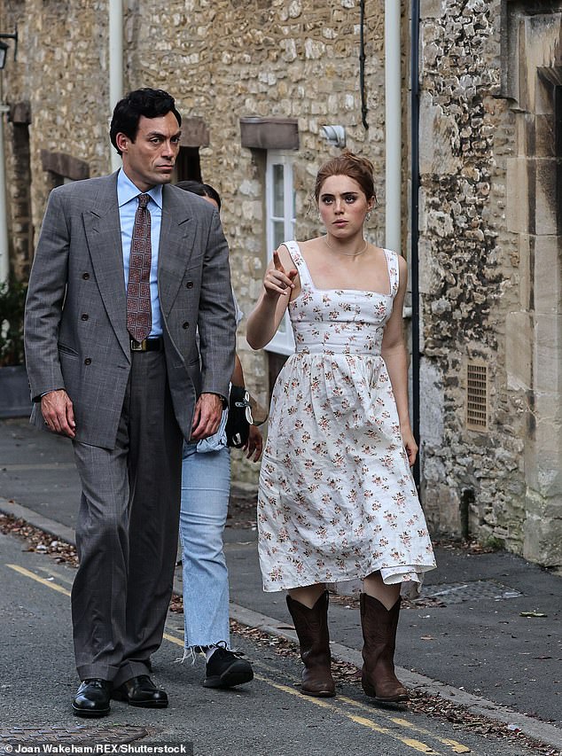 Later this year, Disney+ will show an eight-part series based on Jilly's book Rivals.  Alex Hassell and Bella Maclean are photographed filming in Tetbury, Gloucestershire