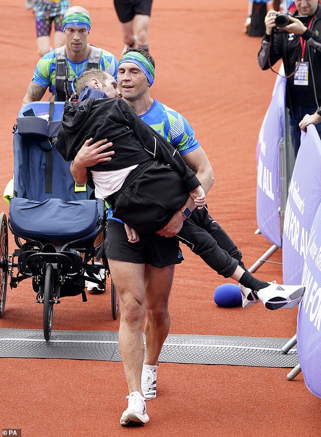 Burrow's good friend Kevin Sinfield carried him across the line at last year's Leeds Marathon