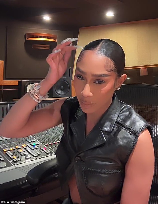 The Medford, Massachusetts native, who donned a leather vest and parted her locks in the clip, took aim at Cardi B on other topics in the diss track