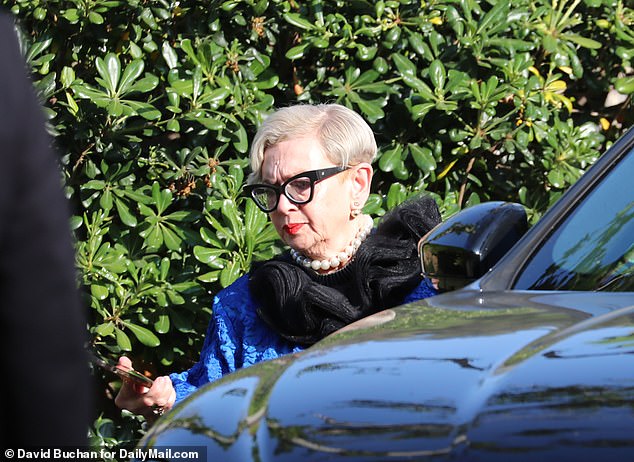 A guest arrives at Rupert Murdoch's home for his wedding to Elena Zhukova, 67