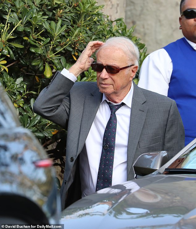 The ceremony took place at Murdoch's beautiful Moraga Estate vineyard in Bel Air, California.  In the photo: a guest arriving at the location