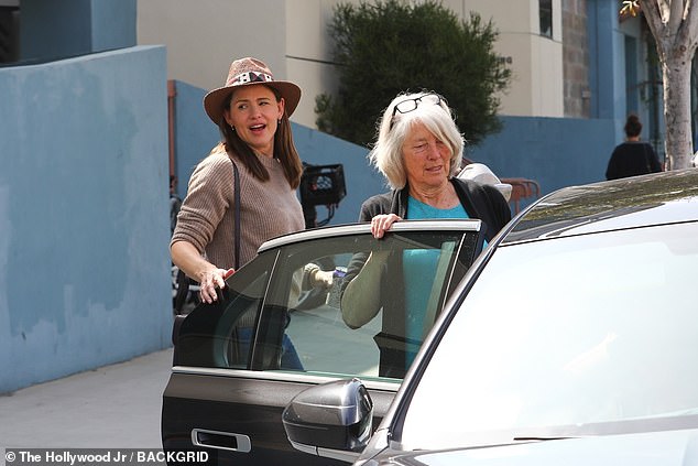 Garner held the door open for Affleck's mother Christine Boldt on a weekend day