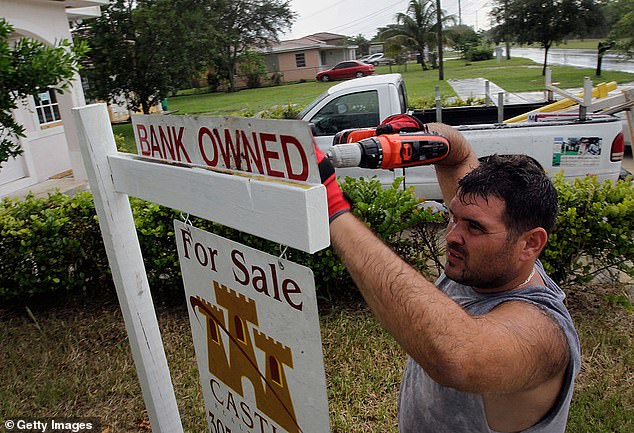 A miscommunication caused her late husband's bank to initiate foreclosure proceedings on the home - a process that usually results in a lender repossessing the property before attempting to sell it to recoup losses.  Pictured is another foreclosed home in Miami