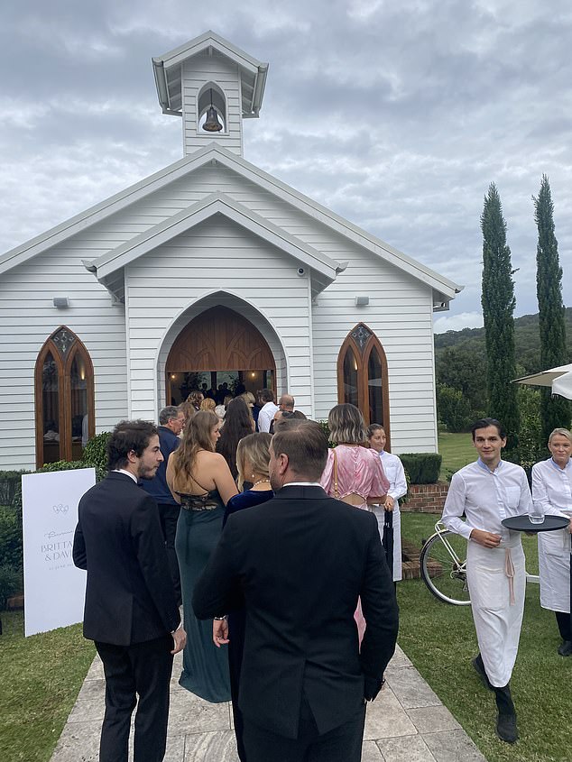 Pictured: guests entering the chapel on Saturday afternoon, before the ceremony