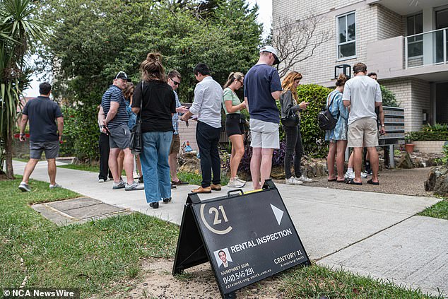 Crowds pictured queuing for a rental inspection in Bondi as the housing crisis continues