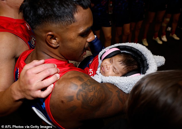 Pickett is pictured with his daughter during the 2024 AFL Round 11 match between Narrm (Melbourne) and Euro-Yroke (St Kilda) at the Melbourne Cricket Ground