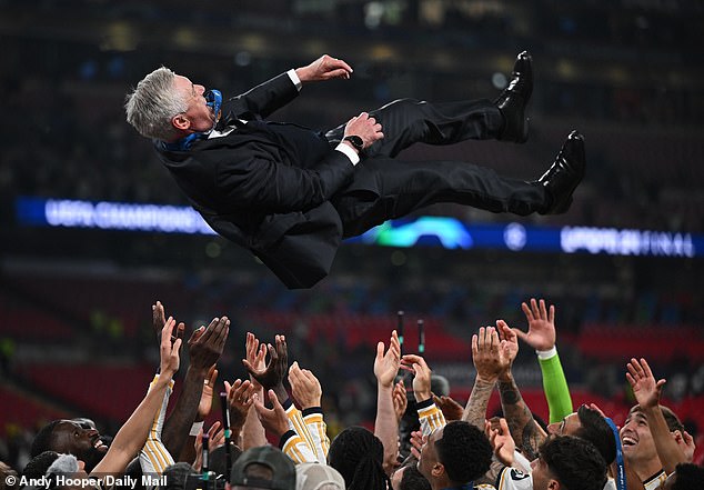 Carlo Ancelotti, 64, was hoisted into the air by his players after claiming his fifth European Cup victory