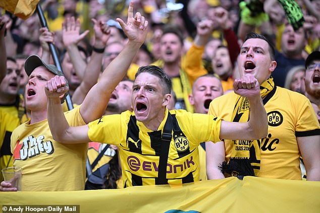Dortmund fans cheer on their players, who had several goal scoring opportunities during the match