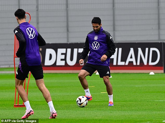 In another poignant revelation, 17 percent of respondents said it was a shame that Ilkay Gundogan (right) was captaining the team - because of his Turkish roots