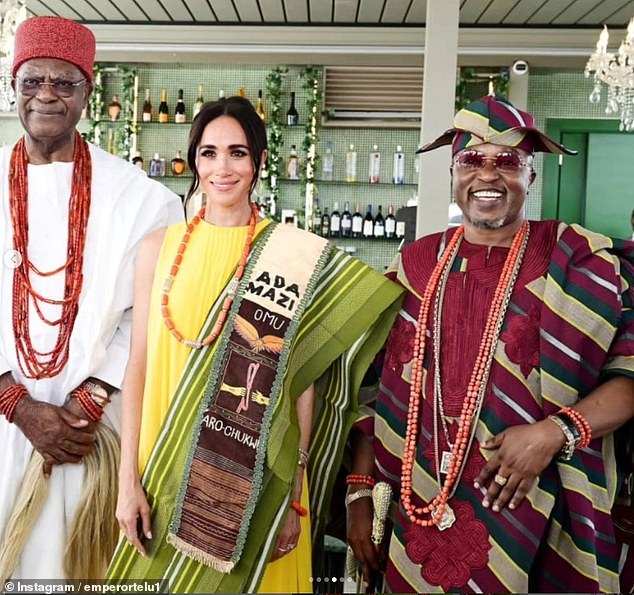 Pictured: Meghan Markle met Yoruba King, Oluwo of Iwo (right), during her quasi-royal tour of Nigeria