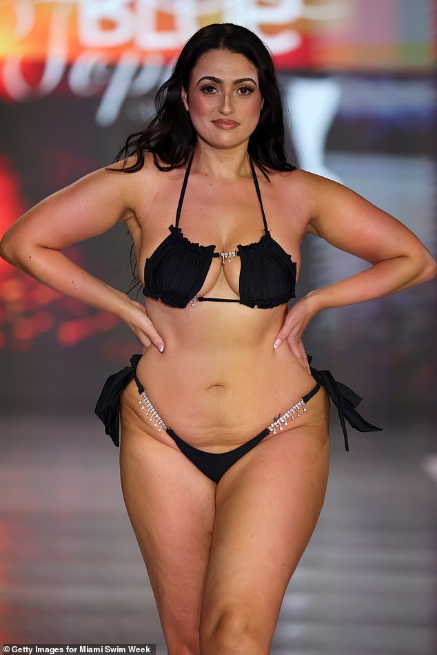 For Blue Topaz, Amel showed off her figure in a tiny black pleated bikini, which featured a cut-out at the décolleté as well as diamond detailing.