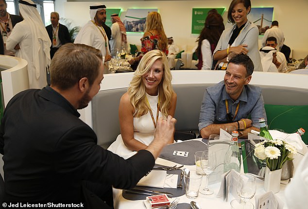 Zamalek's president accused Clattenburg (right) of leaving his wife Claire (center) and starting a gay relationship (the couple pictured at the 2015 Abu Dhabi Grand Prix)