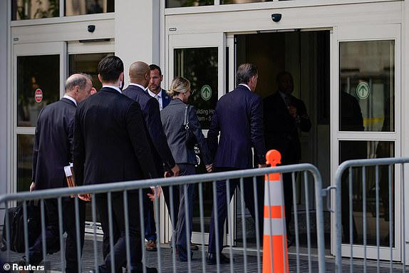 Hunter Biden, son of US President Joe Biden, walks in federal court during the opening day of his trial on criminal weapons charges in Wilmington, Delaware, US, June 3, 2024. REUTERS/Eduardo Munoz