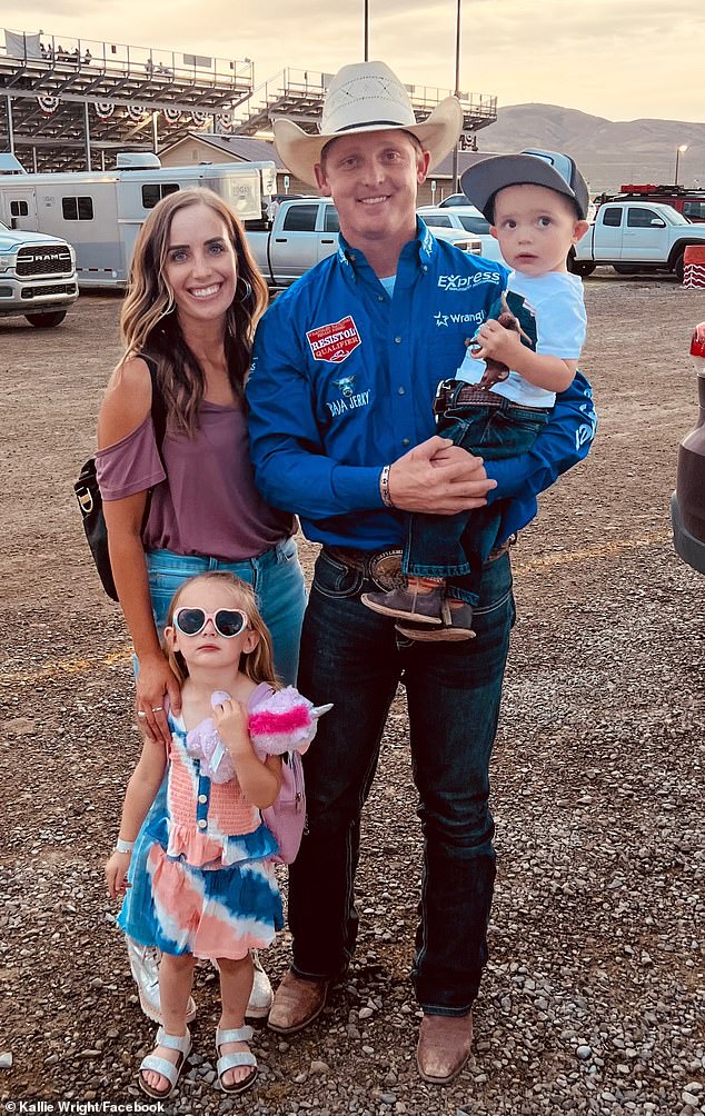 Levi Wright (in father's arms), 3, the son of rodeo star Spencer Wright (right), was taken to hospital after driving his toy tractor into a fast-flowing river